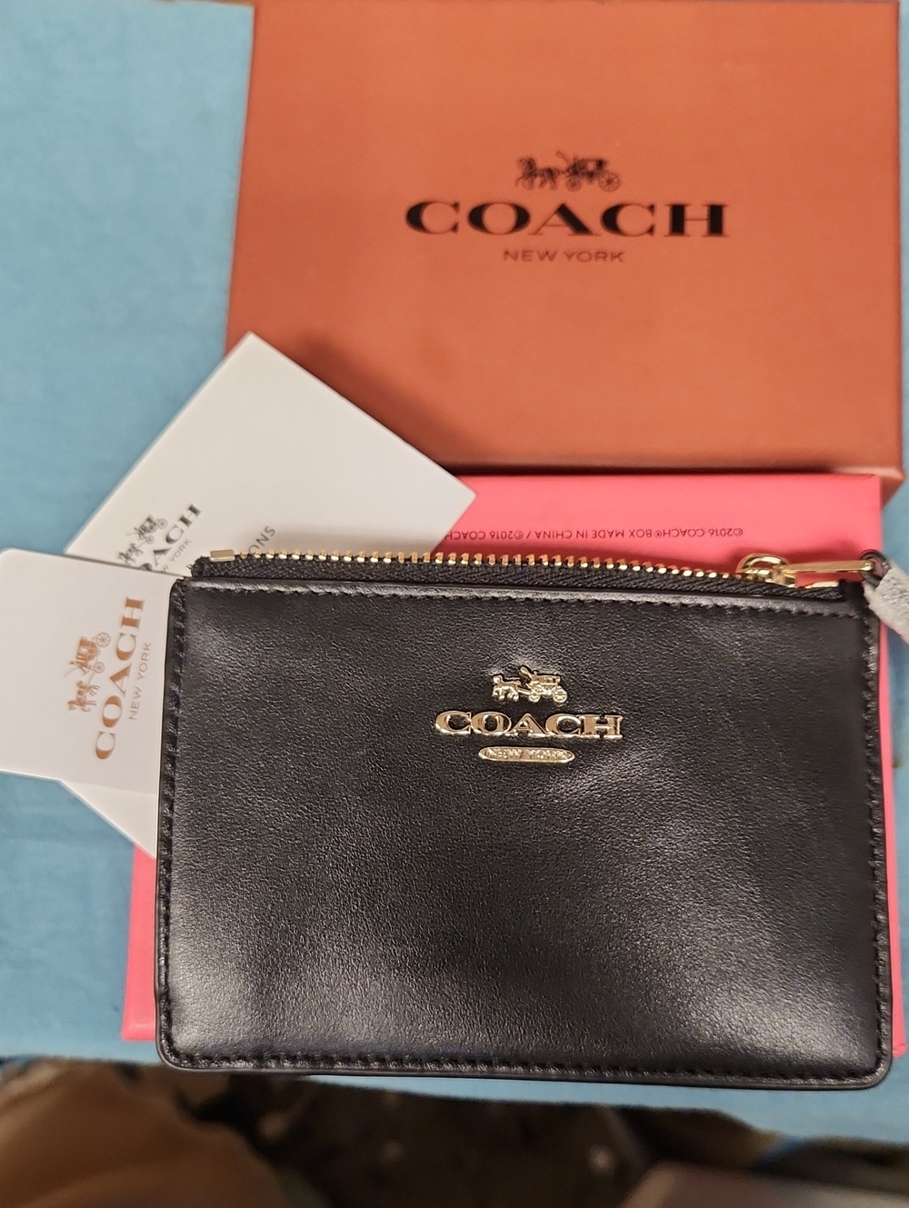 COACH Black Leather Zip Card Holder with Gold Logo